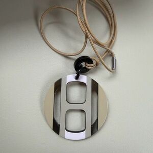 Silver and Tan Pendant Necklace